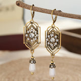 Orecchini Vintage Incastonati in Perle Dorate