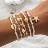 Set di 6 Bracciali in Oro Costiero e Perle