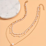 Il set di collane Trinity Pearl Layer