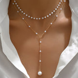 Collana a Stranghe di Perle Graduata
