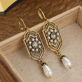 Orecchini Vintage Incastonati in Perle Dorate
