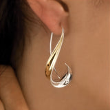 Orecchini in Oro Twist di Lusso Sofisticato